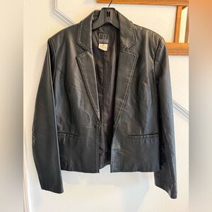 Black Leather Jacket with white Stitching details in new like condition